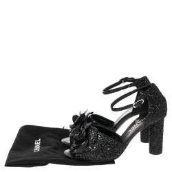 مملوكة مسبقًا صندل شانيل سير كاحل كاميليا غليتر أسود مقاس 38