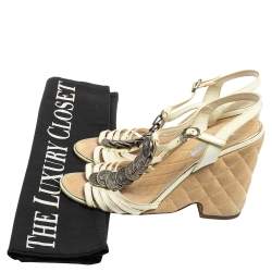 مملوكة مسبقًا Chanel White Patent Leather T Strap Coin Embellished Wedge Sandals Size 39