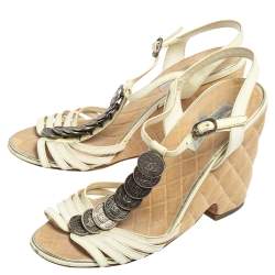 مملوكة مسبقًا Chanel White Patent Leather T Strap Coin Embellished Wedge Sandals Size 39