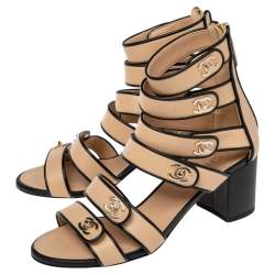 Pre Owned صندل شانيل جلد أسود/بيج غلادياتور مزين شعار الماركة سي سي مقاس 38.5