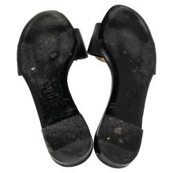 مملوكة مسبقًا حذاء سلايدز شانيل فلات سي سي مزخرف كاميليا جلد كريمي/أسود مقاس 39