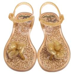 Pre Owned صندل فلات شانيل جيلي غليتر ذهبي مزين كاميليا سي سي مقاس 36