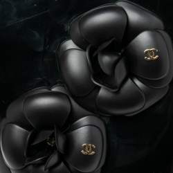 Pre Owned Chanel Black Camellia  Rubber Rain Boots Size 38