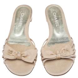 مملوكة مسبقًا Chanel  Beige Canvas Bow Flat Sandals Size 38