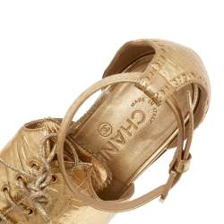 مملوكة مسبقًا صندل شانيل رباط علوي سير كاحل سي سي جلد وسويدي أسود/ ذهبي مقاس 39.5