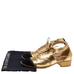 مملوكة مسبقًا صندل شانيل رباط علوي سير كاحل سي سي جلد وسويدي أسود/ ذهبي مقاس 39.5