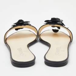 Pre Owned صندل سلايد فلات شانيل جلد أسود مزين زهرة كاميليا مقاس 37.5