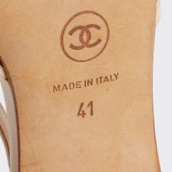 مملوكة مسبقًا صندل شانيل جلد كريمي وشبكة بفيونكة سي سي وحزام خلفي للكاحل مقاس 41