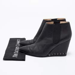 مملوكة مسبقًا حذاء بوت للكاحل شانيل جلد أسود مزين سلسلة كعب روكي مقاس 39