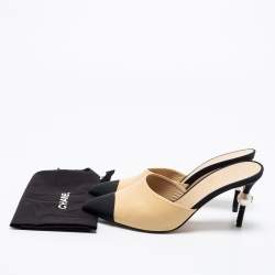 مملوكة مسبقًا Chanel Beige/Black Leather and Canvas CC Pearl Embellished Heel Mules Size 37