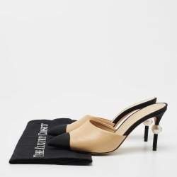 مملوكة مسبقًا Chanel Beige/Black Leather and Fabric CC Cap Toe Embellished Mules Size 36
