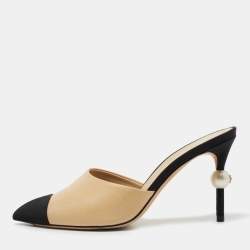 مملوكة مسبقًا Chanel Beige/Black Leather and Fabric CC Cap Toe Embellished Mules Size 36