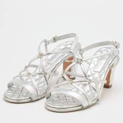 Pre Owned Chanel Silver Leather Criss Cross CC Ankle Strap Sandals Size 38.5
