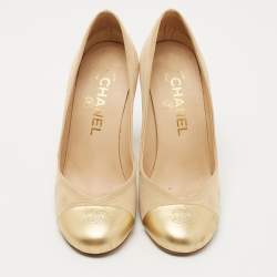 Pre Owned Chanel Gold/Beige Canvas and Leather CC Cap Toe Pumps Size 36 