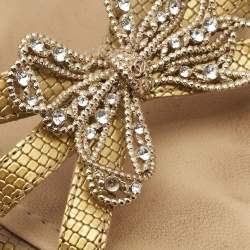 Pre Owned Chanel Gold Textured Leather Crystal Embellished Bow Ankle Strap Sandals Size 37.5
