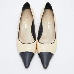 Pre Owned Chanel Beige/Black Leather Cap Toe Pumps Size 38.5
