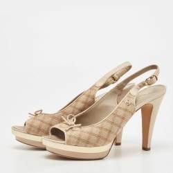 Pre Owned Chanel Cream/Beige Canvas And Leather CC Bow Peep Toe Platform Slingback Sandals Size 40.5