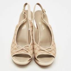 Pre Owned Chanel Cream/Beige Canvas And Leather CC Bow Peep Toe Platform Slingback Sandals Size 40.5