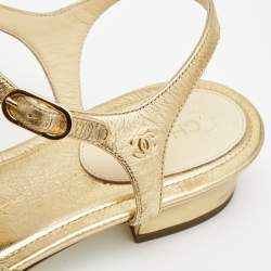 Chanel Metallic Gold Texture Leather CC Camellia Leaf Pearl Ankle Strap Thong Flat Sandals Size 38.5