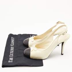 Pre Owned Chanel Off White/Black Leather CC Cap Toe Bow Slingback Pumps Size 40