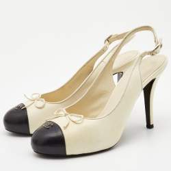 Pre Owned Chanel Off White/Black Leather CC Cap Toe Bow Slingback Pumps Size 40
