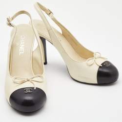 Pre Owned Chanel Off White/Black Leather CC Cap Toe Bow Slingback Pumps Size 40