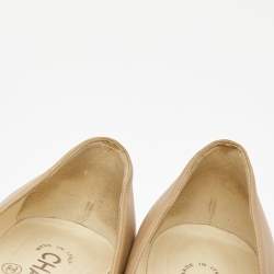 Pre Owned Chanel Beige Leather CC Camellia Pumps Size 37.5