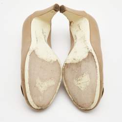 Pre Owned Chanel Beige Leather CC Camellia Pumps Size 37.5