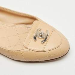 Pre Owned Chanel Beige Quilted Leather CC Turn Lock Loafers Size 35.5