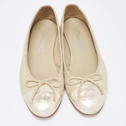 Pre Owned Chanel Metallic Gold Leather and Texture Suede CC Cap Toe Flats Size 37.5