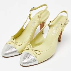 Pre Owned Chanel Yellow/Silver Leather and Laminated Suede CC Cap Toe Bow Slingback Pumps Size 38.5