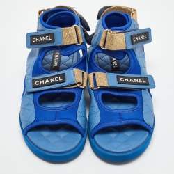 Pre Owned Chanel Blue Quilted Leather and Neoprene CC Ankle Strap Flat Sandals Size 39