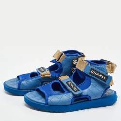 Pre Owned Chanel Blue Quilted Leather and Neoprene CC Ankle Strap Flat Sandals Size 39