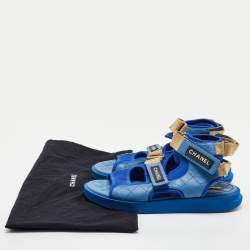 Pre Owned Chanel Blue Quilted Leather and Neoprene CC Ankle Strap Flat Sandals Size 39