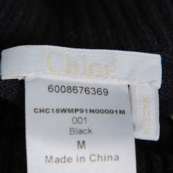 مملوكة مسبقًا بلوفر كلوي رقبة مرتفعة تريكو انتارسيا لوريكس أسود مقاس وسط (ميديوم)