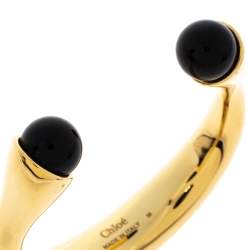 Pre Owned Chloe Darcey Black Bead Gold Tone Open Cuff Bracelet M