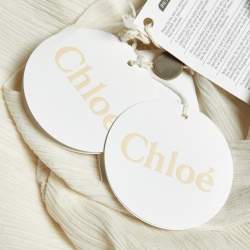 Pre Owned بلوزة كلوي أيقونية حليب أبيض مزيج قطن بكشكشة وربطة عنق مقاس كبير