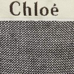 Pre Owned توب كلوي شير أكمام طويلة حياكة حرير أسود مقاس صغير (صغير جدًا)