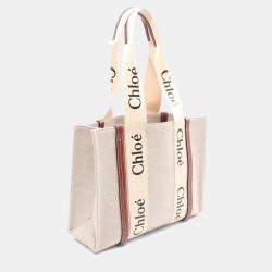 مملوكة مسبقًا حق�يبة يد توتس كلوي وودي جلد كانفاس بنية بيج متوسطة