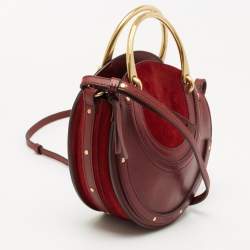 Pre Owned Chloe Maroon Leather and Suede Small Pixie Round Crossbody Bag