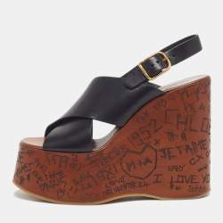 مملوكة مسبقًا صندل كلوي جلد أسود ماكسيم منصة كعب روكي مقاس 38