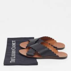 مملوكة مسبقًا صندل مسطح بتصميم متقاطع جلد أسود كلوي لورين مقاس 37