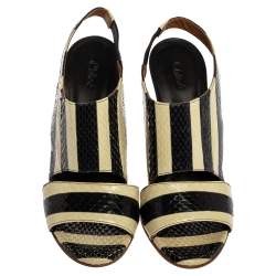 Pre Owned صندل كلوي جلد ثعبان مخطط كريمي أسود إيرس كعب روكي بحزام للكاحل مقاس 37.5