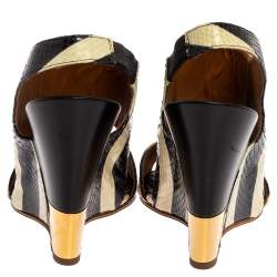 Pre Owned صندل كلوي جلد ثعبان مخطط كريمي أسود إيرس كعب روكي بحزام للكاحل مقاس 37.5