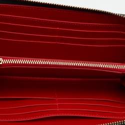 مملوكة مسبقًا محفظة كريستيان لوبوتان جلد لامع متعدد الألوان نقشة بانيتون مرصعة بمسامير سبايك بسحاب ملتف