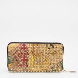 مملوكة مسبقًا محفظة كريستيان لوبوتان جلد لامع متعدد الألوان نقشة بانيتون مرصعة بمسامير سبايك بسحاب ملتف