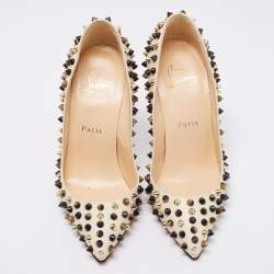 Pre Owned Christian Louboutin Cream Leather Follies Spikes Pumps Size 35