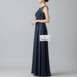 مملوكة مسبقًا حقيبة كلاتش كريستيان لوبوتان لوبي 54 جلد فضية براقة