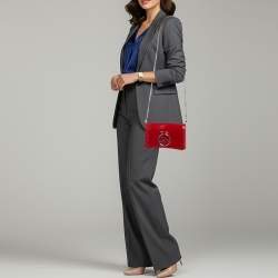 مملوكة مسبقًا حقيبة كلتش كريستيان لوبوتان روبيلو جلد أحمر وسويدي