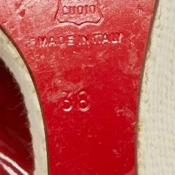 مملوكة مسبقًا صندل كريستيان لوبوتان بلاتفورم بكعب روكي جلد لماع أحمر مقاس 38